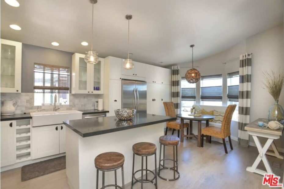 mobile home remodeling ideas - install curtain rods as high as possible