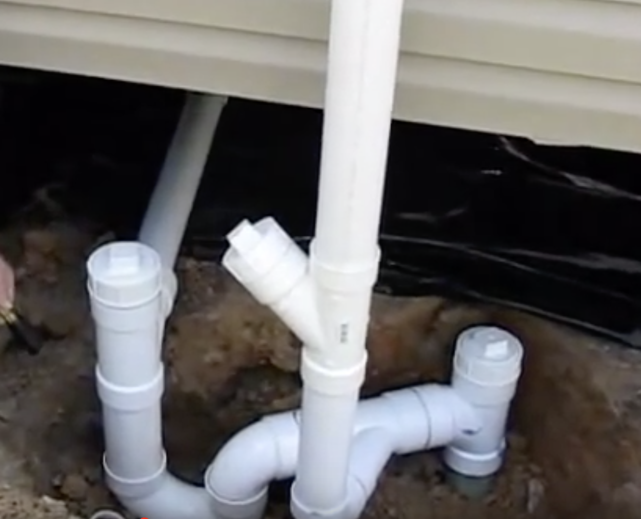 Clean out and stack vent on new manufactured home install