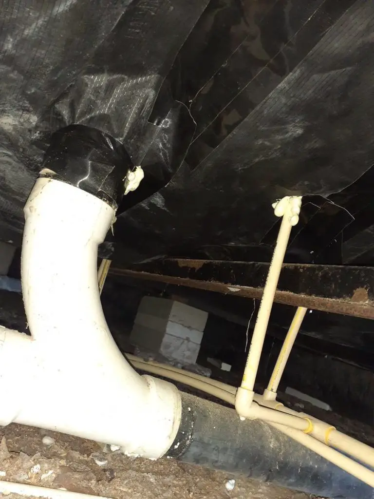Sealing around plumbing pipes with belly baord
