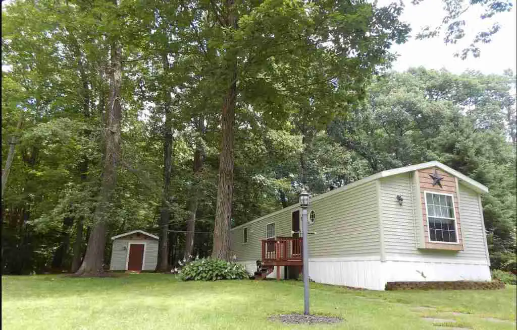 Buying a mobile home in new york single wide with trees