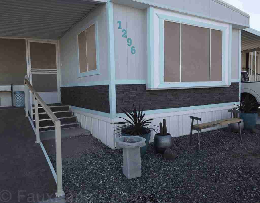 Fuax rock panel used on mobile home sideing 1