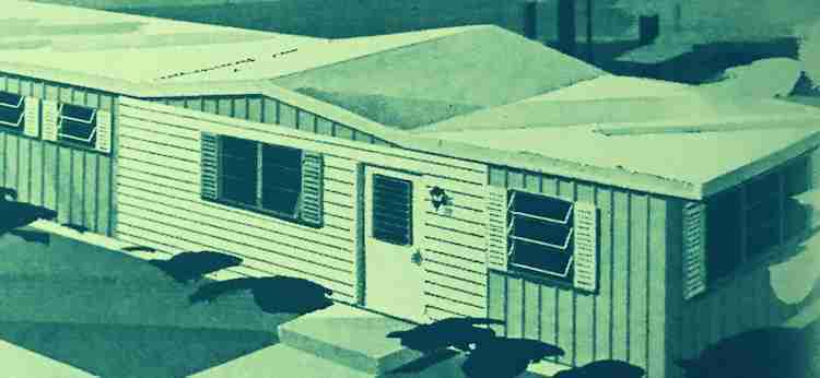 Single wide mobile home witrh a gabled roof just in the living room area