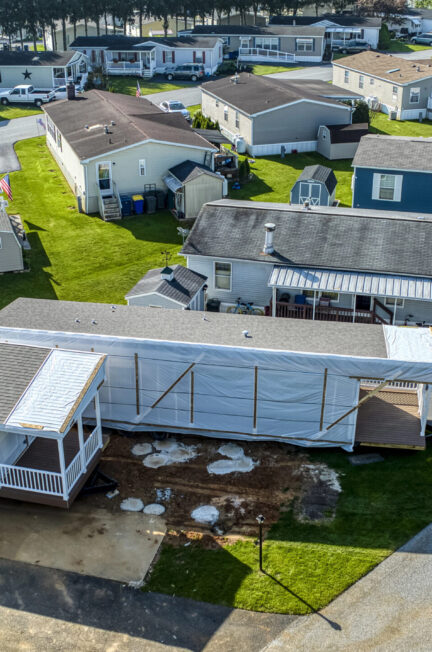 aerial of new double wide in park scaled