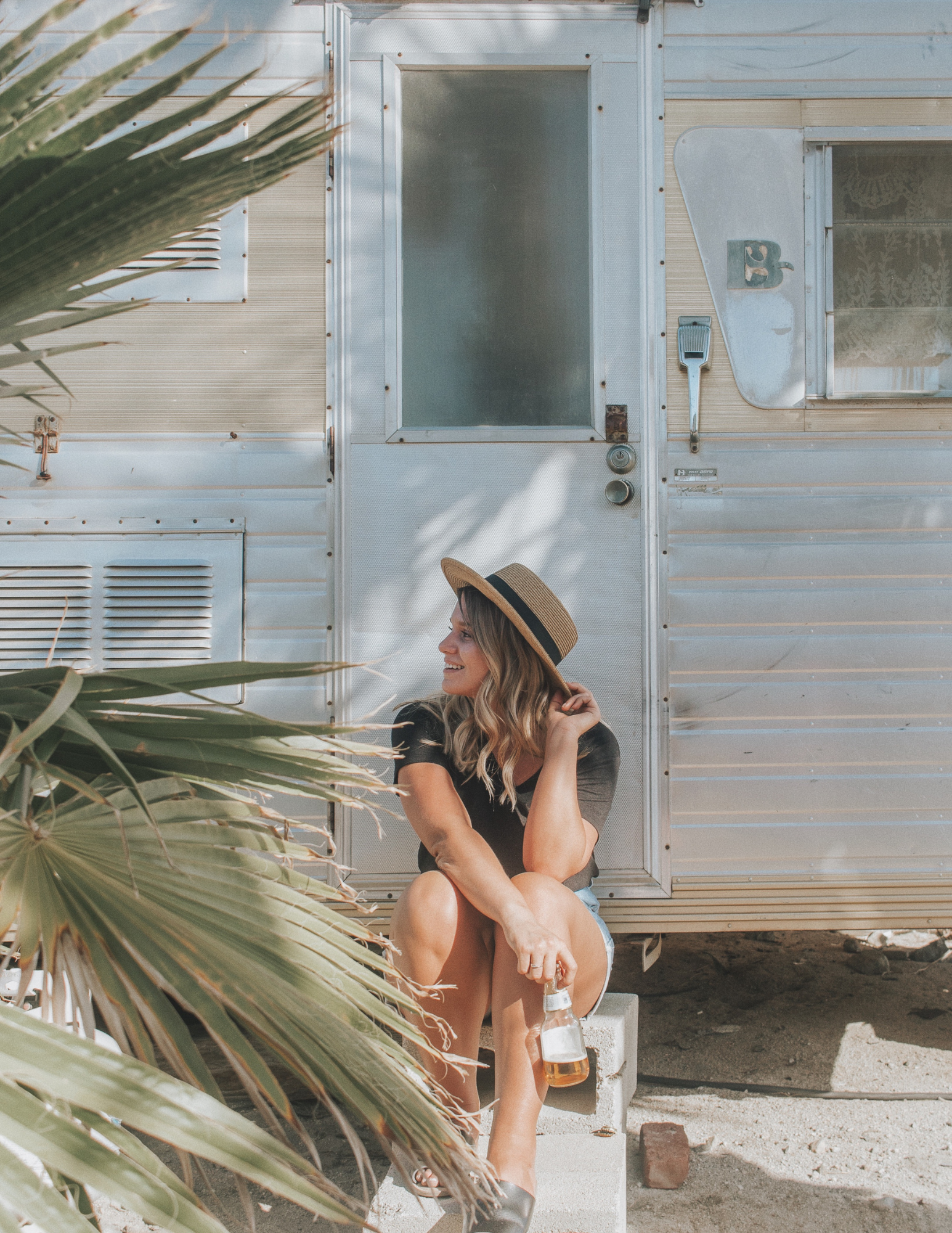happy lady on camper step