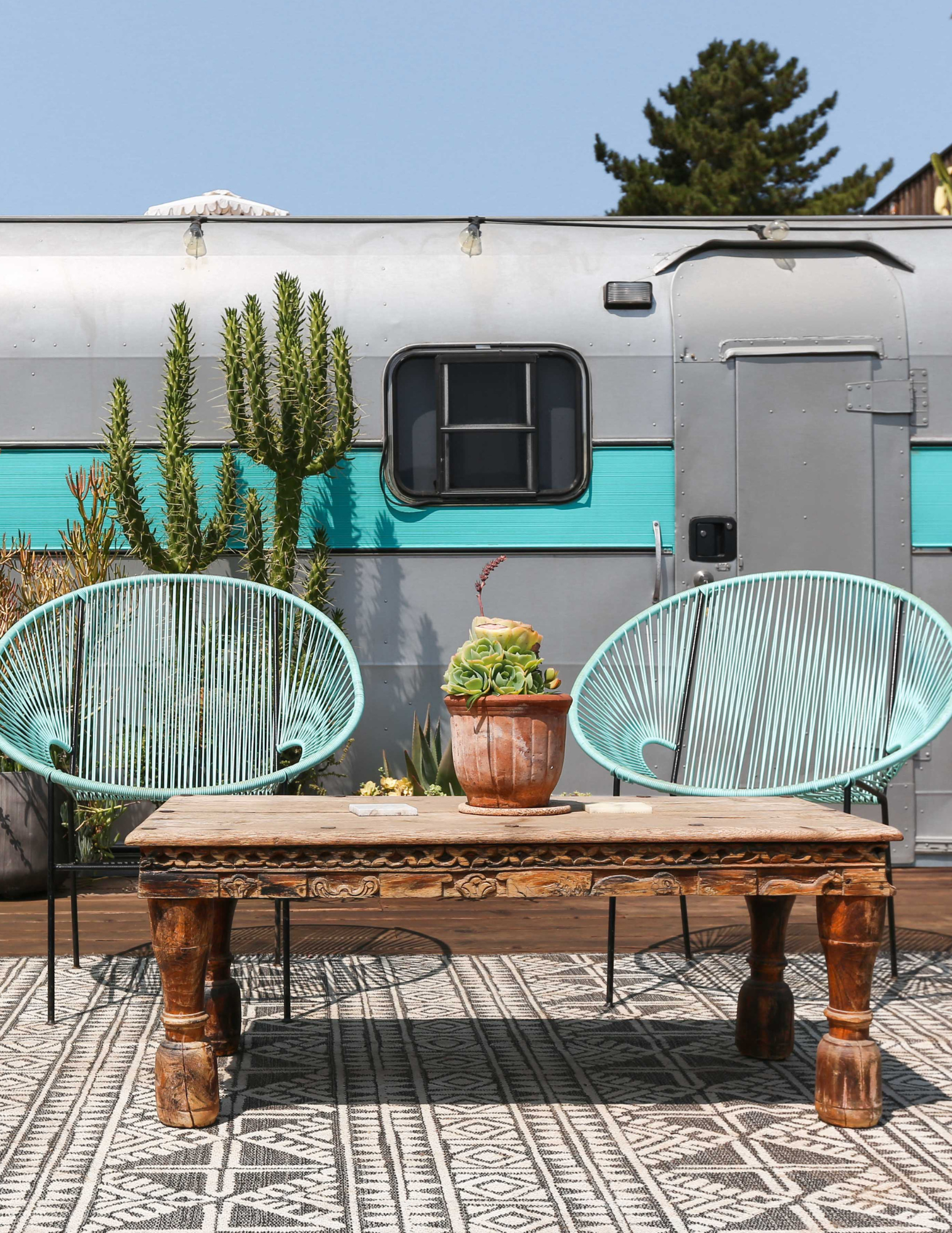silver camper with great deck