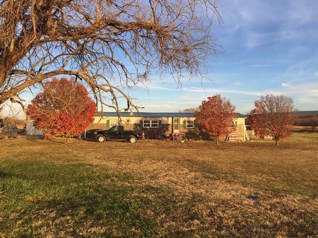 Beautiful exterior of 1985 Liberty single wide mobile home 
