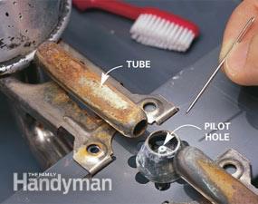 Try cleaning the pilot hole, then relight.