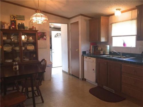 Our 10 Favorite Craigslist Manufactured Home Listings in July 2017 -1997 double wide in PA for $59,000 - kitchen