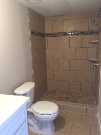 1998 single wide manufactured home bathroom gets tiled