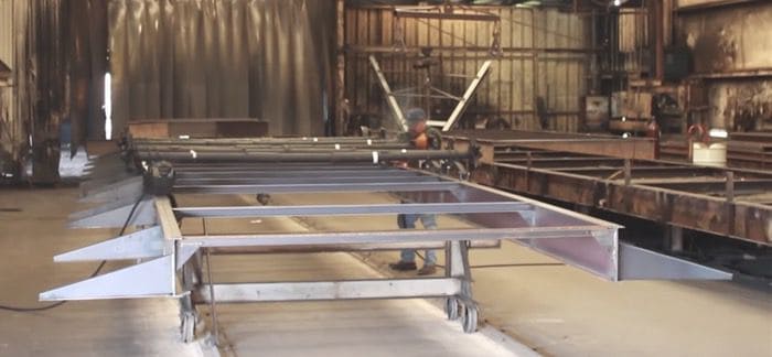 Steel chassis with outriggers in palm harbor facotry