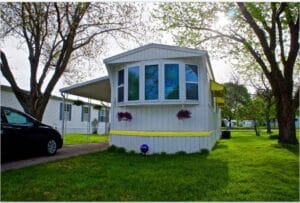 affordable mobile home remodel - 1968 Landola single wide goes Retro (exterior trim painted)