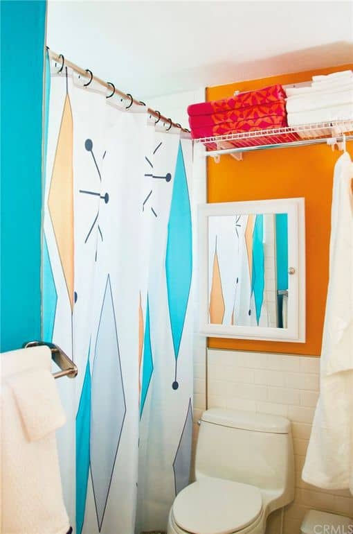 Bathroom with shelves and hanging bar