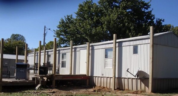 building a mobile home roof over - step by step - installing posts around the home