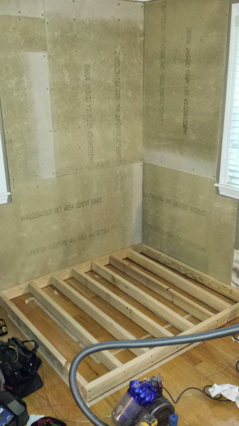 cement panels added to walls and hearth for stove installation