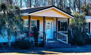 double wide manufactured home with traditional pitched front porch00002
