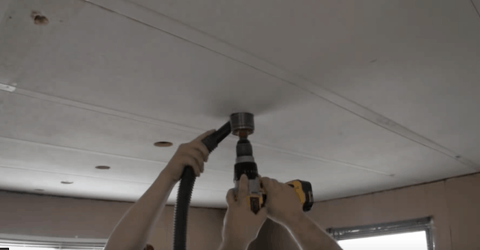 drill-and-plug-method-of-blowing-insulation-in-a-mobile-home-attic1