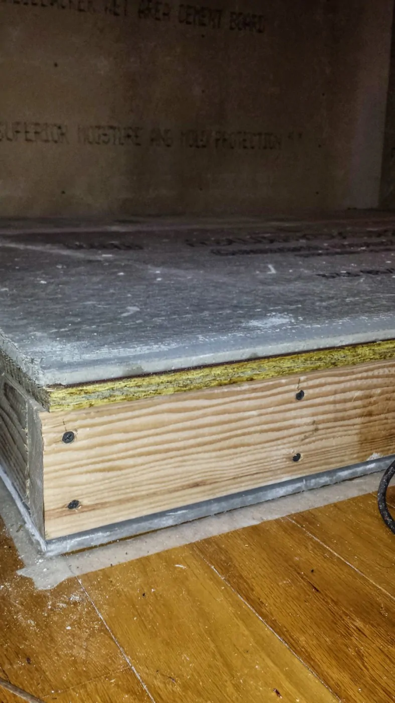 layers cement brd 1-2 in plywood 2x4 frame sheet rock