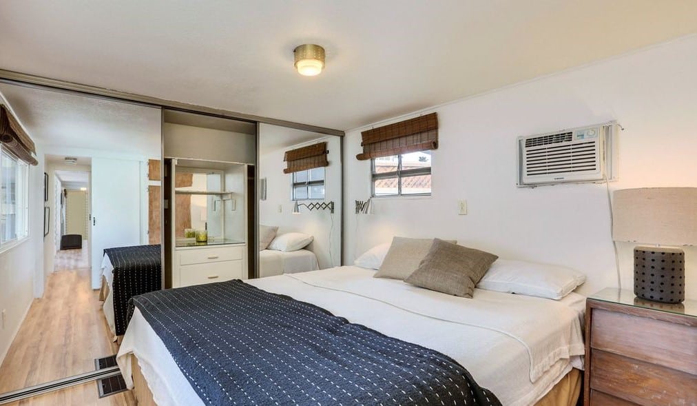 Mid-Century Design Is The Star Of This Unforgettable 1950'S Vintage Trailer Mint green trailer bedroom