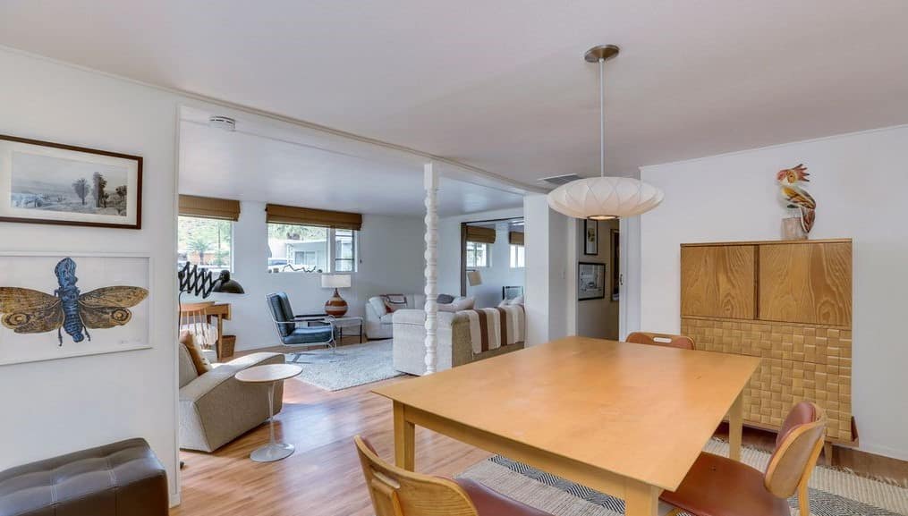 Mid-Century Design Is The Star Of This Unforgettable 1950'S Vintage Trailer Mint green trailer dining area