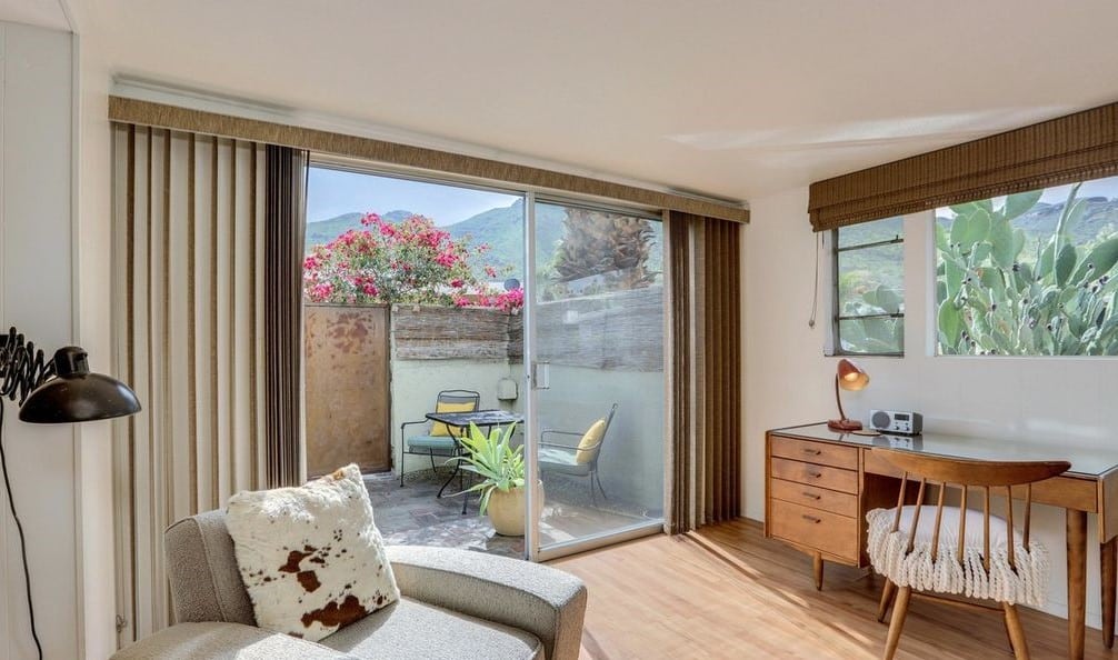 Mid-Century Design Is The Star Of This Unforgettable 1950'S Vintage Trailer Mint green trailer sliding door entrance