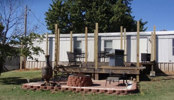 mobile home roof over - posts set around home