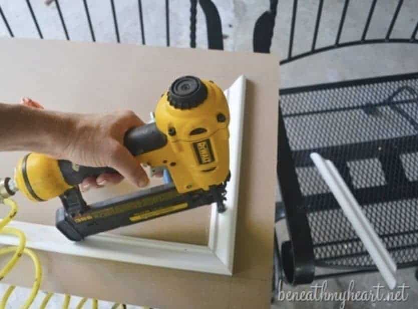 nailing-trim-to-the-MDF-to-create-your-own-cabinet-door-beneath-my-heart.net_-1