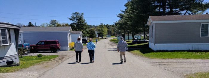 neighbors walking in resident-owned manufactured home community
