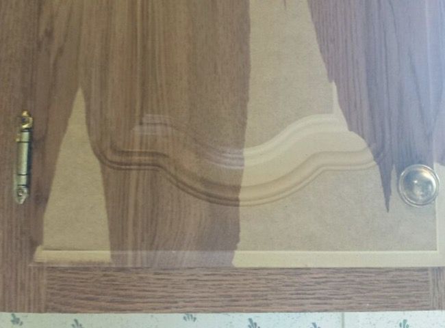 paper-peeling-from-MDF-cabinet-in-mobile-home-hometalk