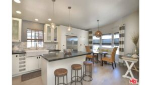 mobile home remodeling ideas - install curtain rods as high as possible