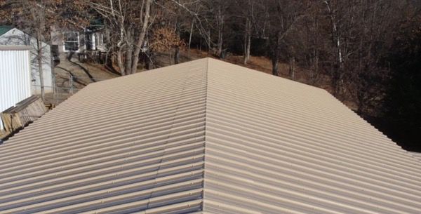 ridge crap over metal roof over