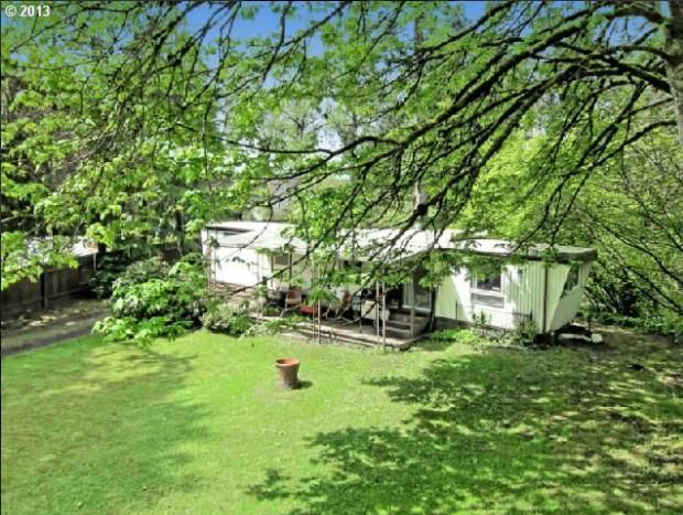 Oregon single wide mobile home for sale surrounded by gorgeous green property