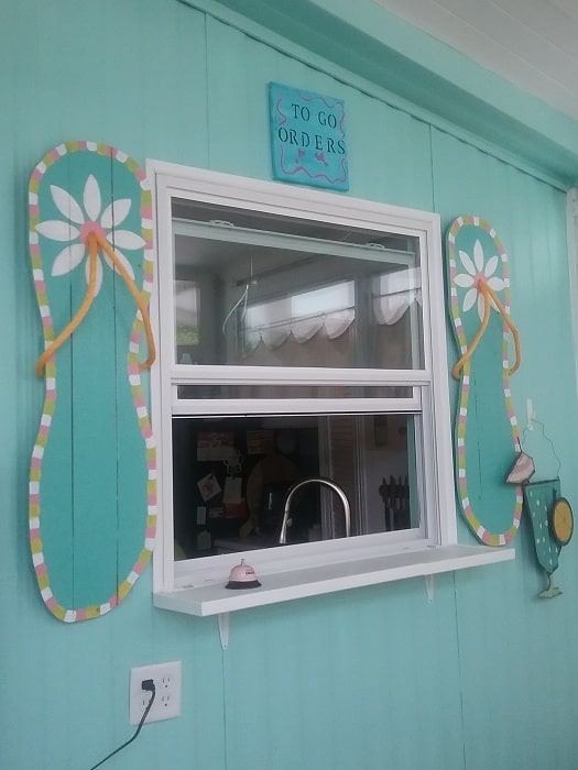 flip flop shutters on a mobile home beach house