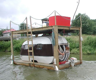 Mobile Home Ingenuity-camper in water
