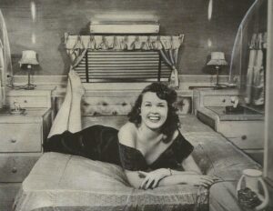 happy woman on camper bed